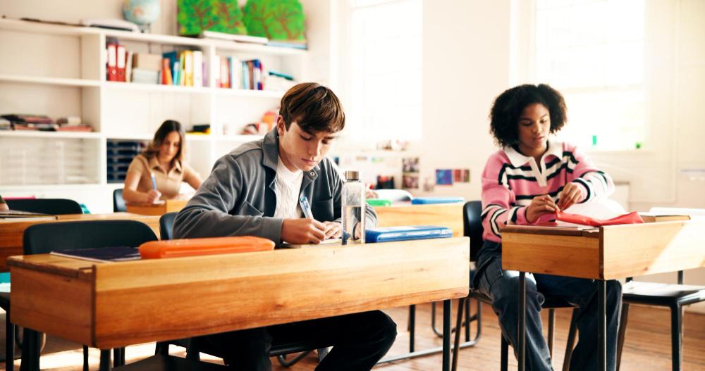 Upper school students in a seminar-style classroom